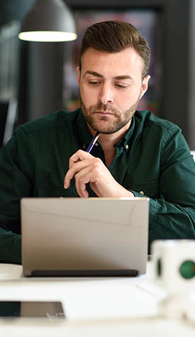 Young Man on computer